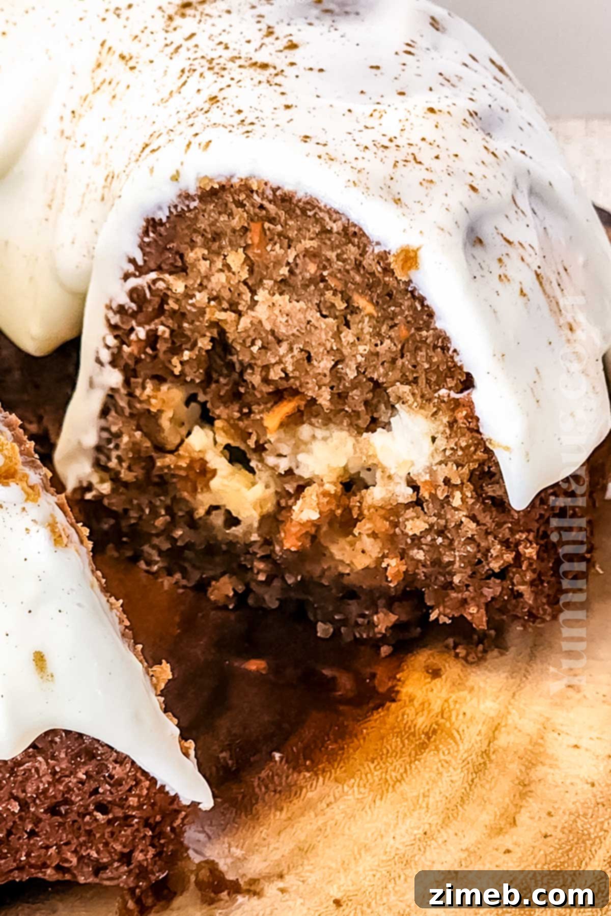 Close-up of the creamy cheesecake filling inside the Carrot Bundt Cake.