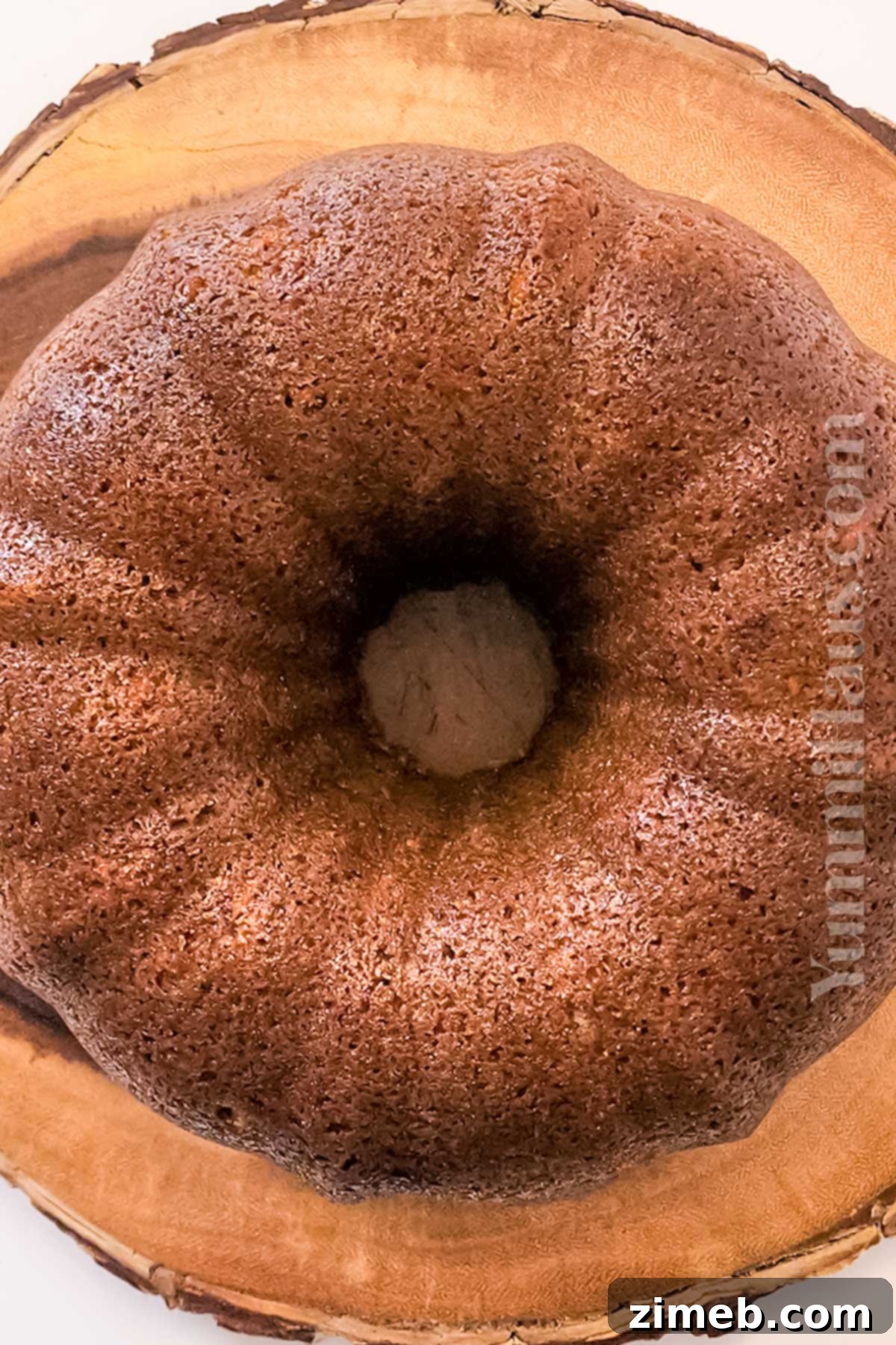 A beautifully frosted Carrot Bundt Cake, ready to be served.
