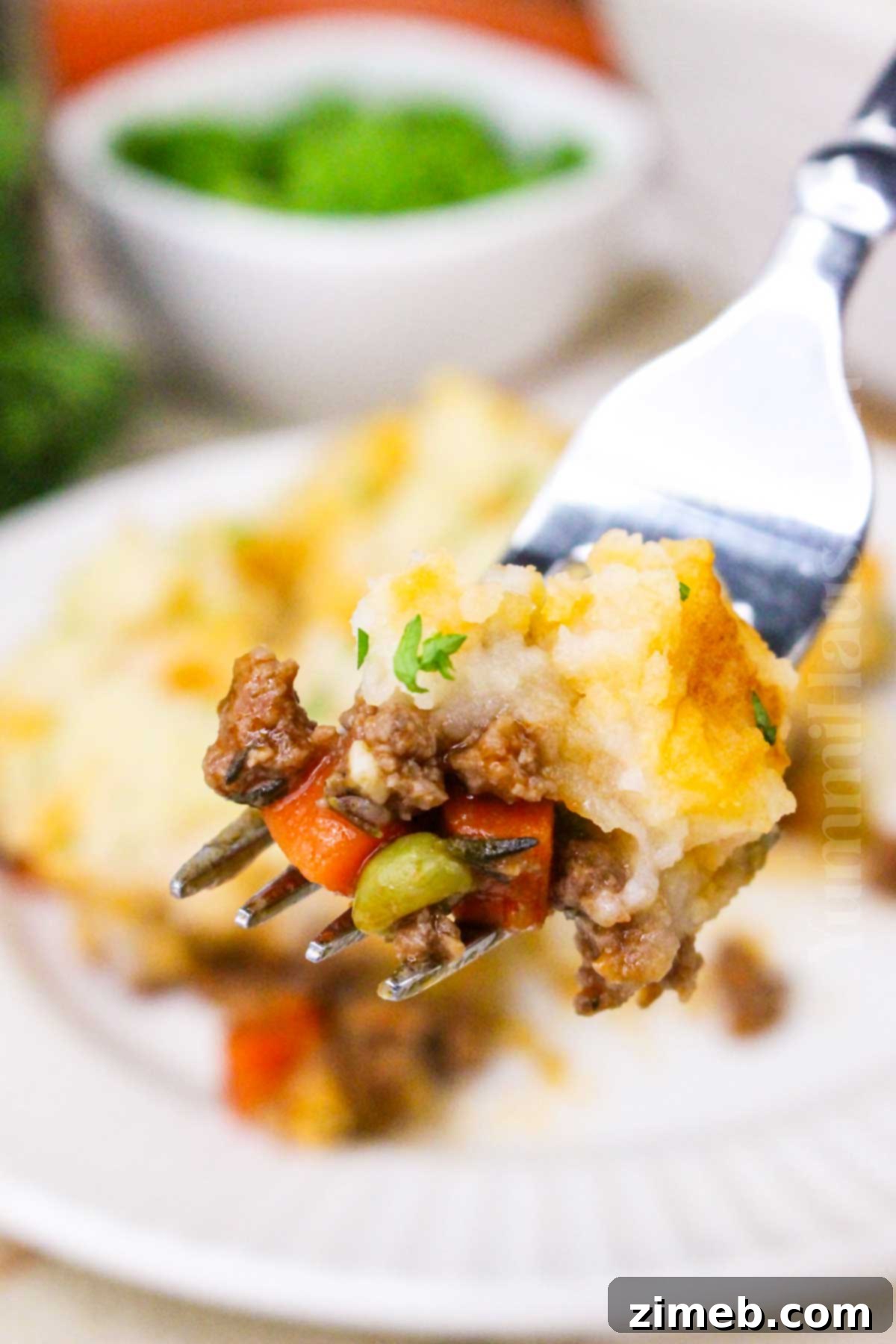 Hearty Irish Cottage Pie 2 Classic Irish Cottage Pie with savory ground beef and creamy mashed potato topping