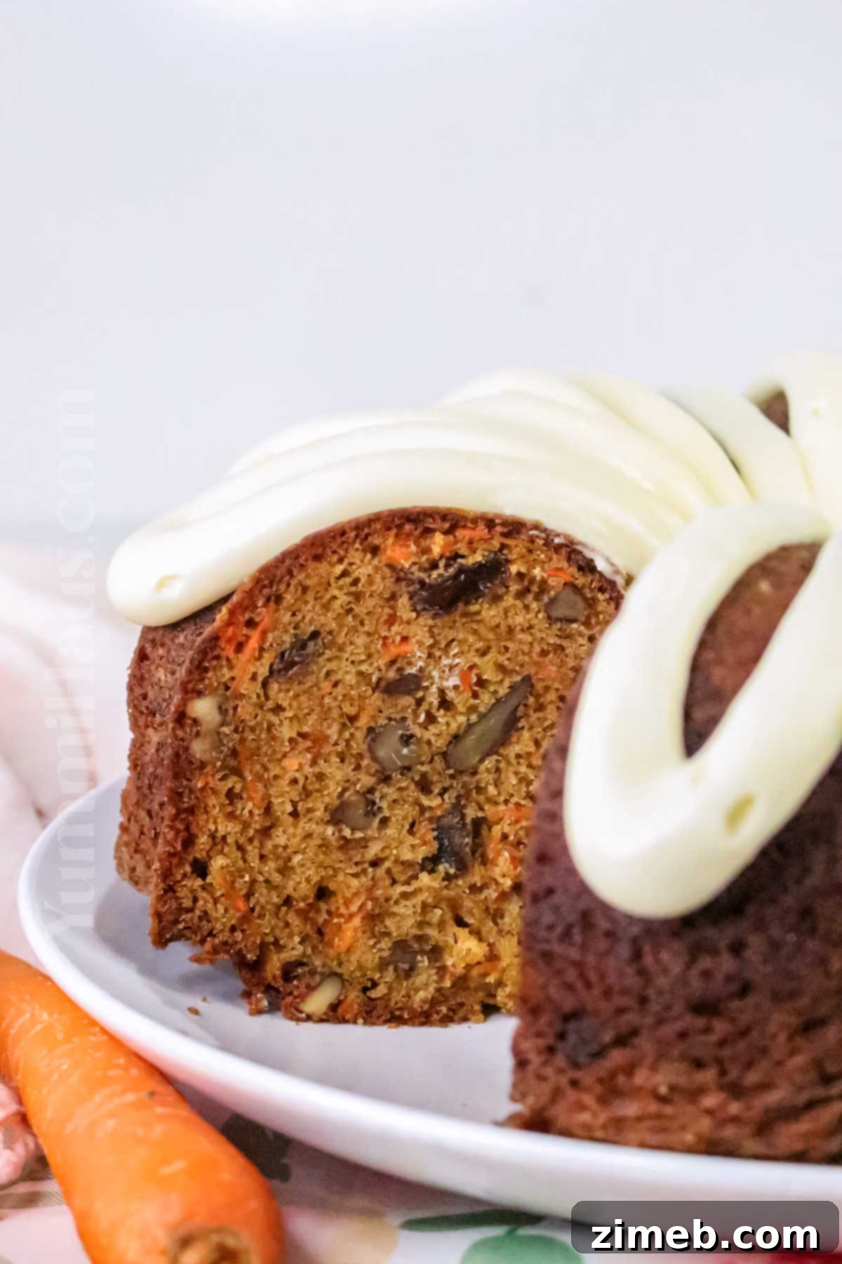 Rich Carrot Cake with Silken Cream Cheese Frosting 14 cream cheese icing on a bundt cake
