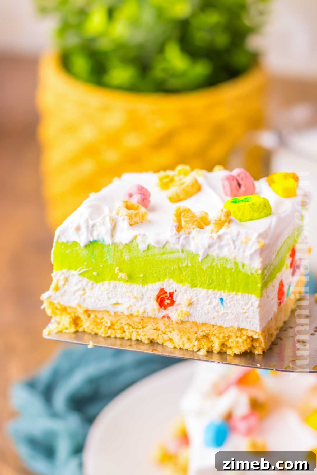 Rainbow Charm Elixir 15 Final view of the no-bake St. Patrick's Day dessert, Lucky Charms Lush, with all layers visible