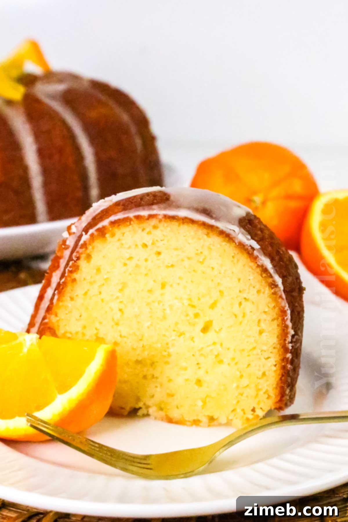 Zesty Orange Loaf 3 Orange Pound Cake recipe with a perfect golden crust and moist interior.