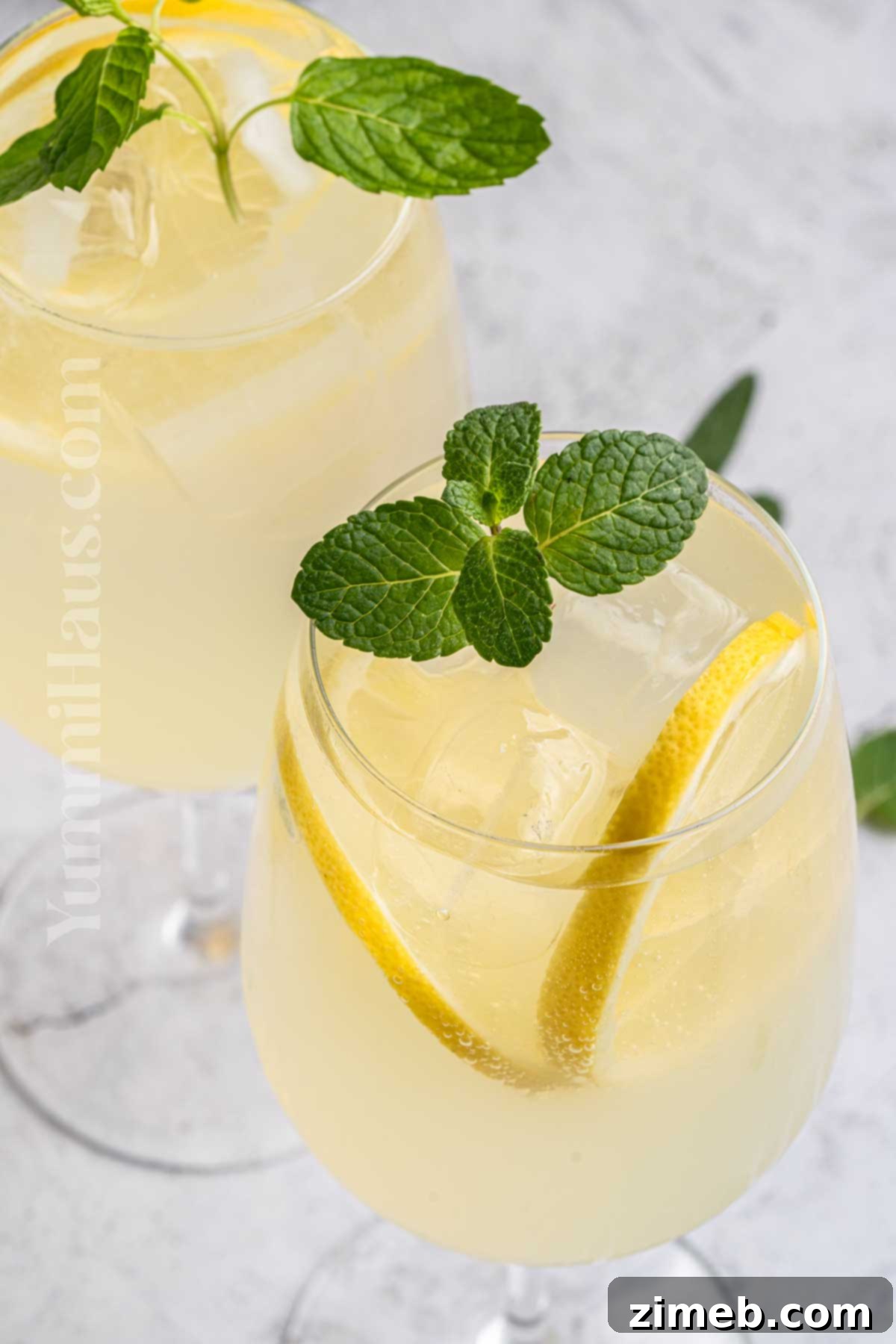 Refreshing Limoncello Spritz 14 A vibrant lemon cocktail in a stylish glass with fresh fruit slices