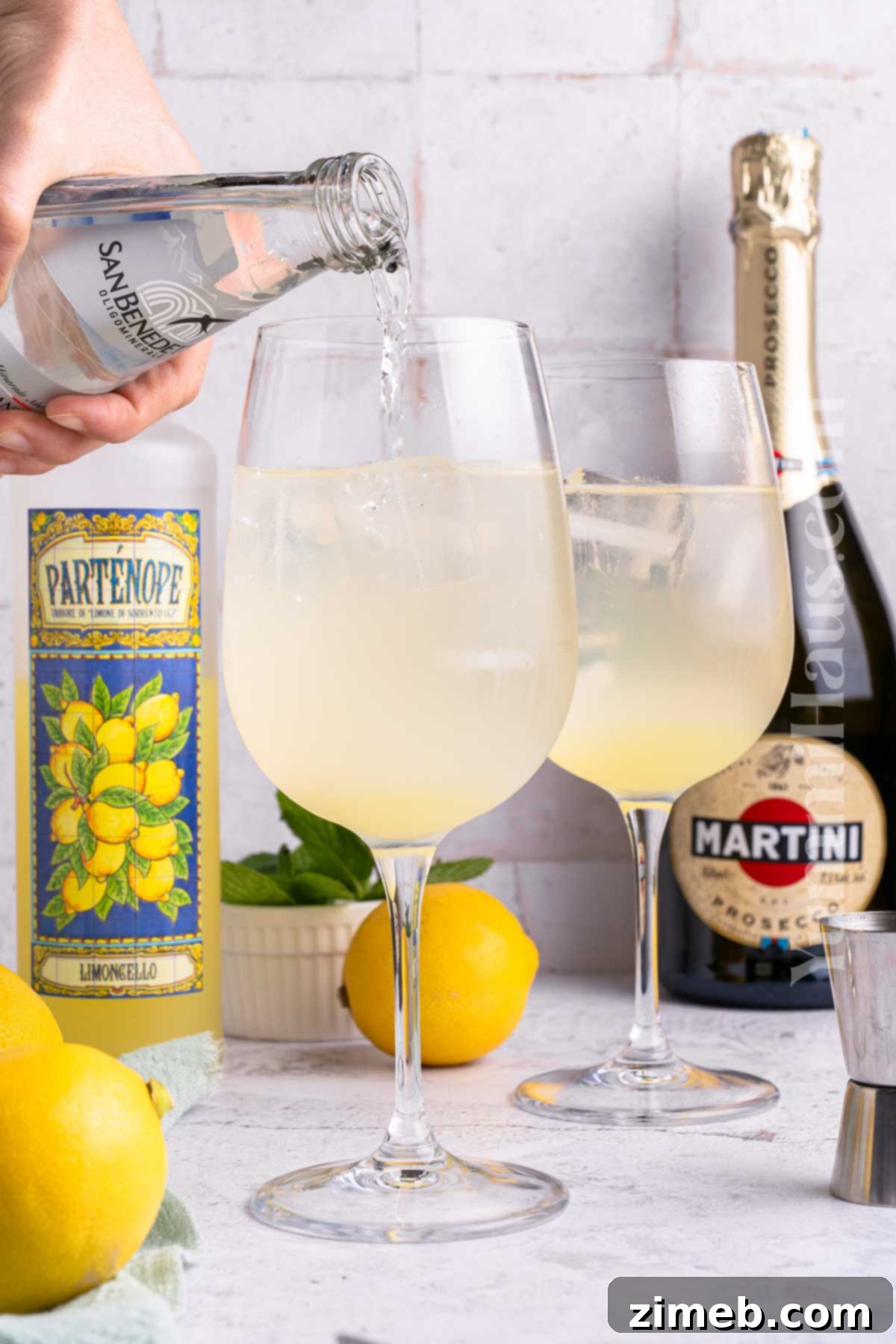 Refreshing Limoncello Spritz 7 Close-up shot of a Limoncello Spritz being gently stirred in a glass