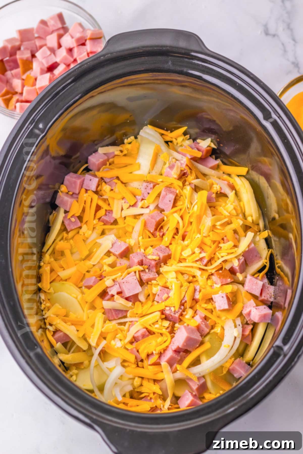 Slow Cooker Scalloped Ham and Potatoes 5 Step-by-step: How to make Slow Cooker Scalloped Ham and Potatoes