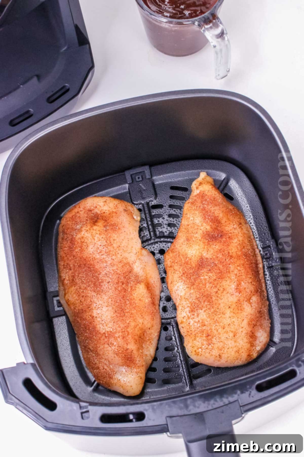 Crispy Air Fryer BBQ Chicken 6 Chicken breasts seasoned and ready for the air fryer