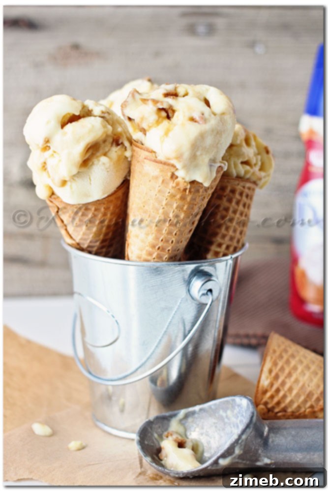 Caramel Sugar Cone Frozen Yogurt Creamy Caramel Frozen Yogurt with luscious swirls of caramel sauce, captured up close.