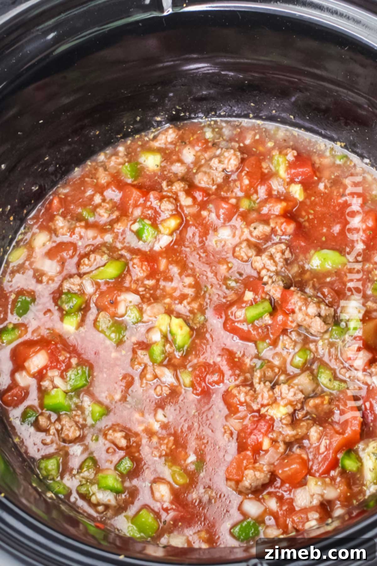 Effortless Crockpot Goulash 7 Meaty sauce in the slow cooker with Goulash