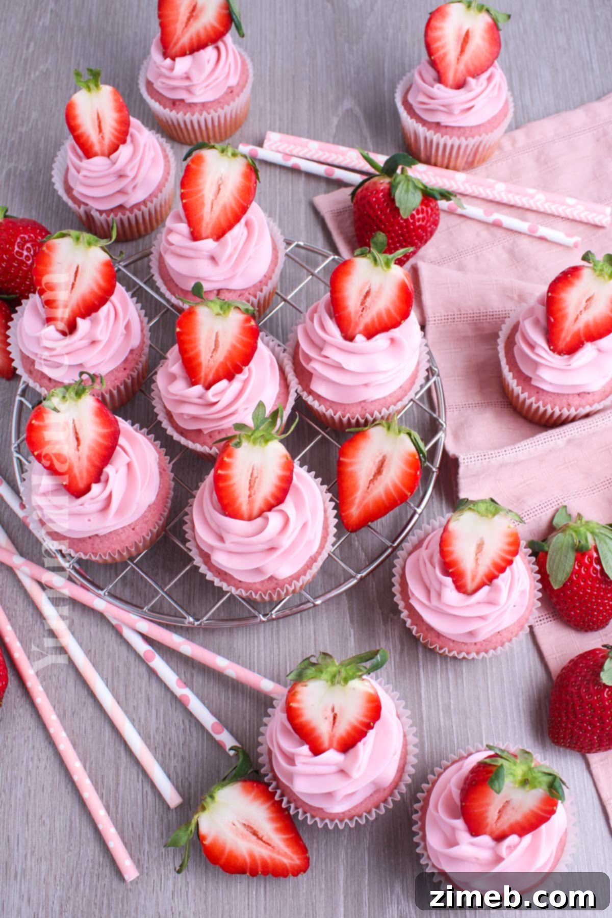 Sweet Strawberry Delights 15 Rows of pink cupcakes made with fresh strawberries, ready to be frosted