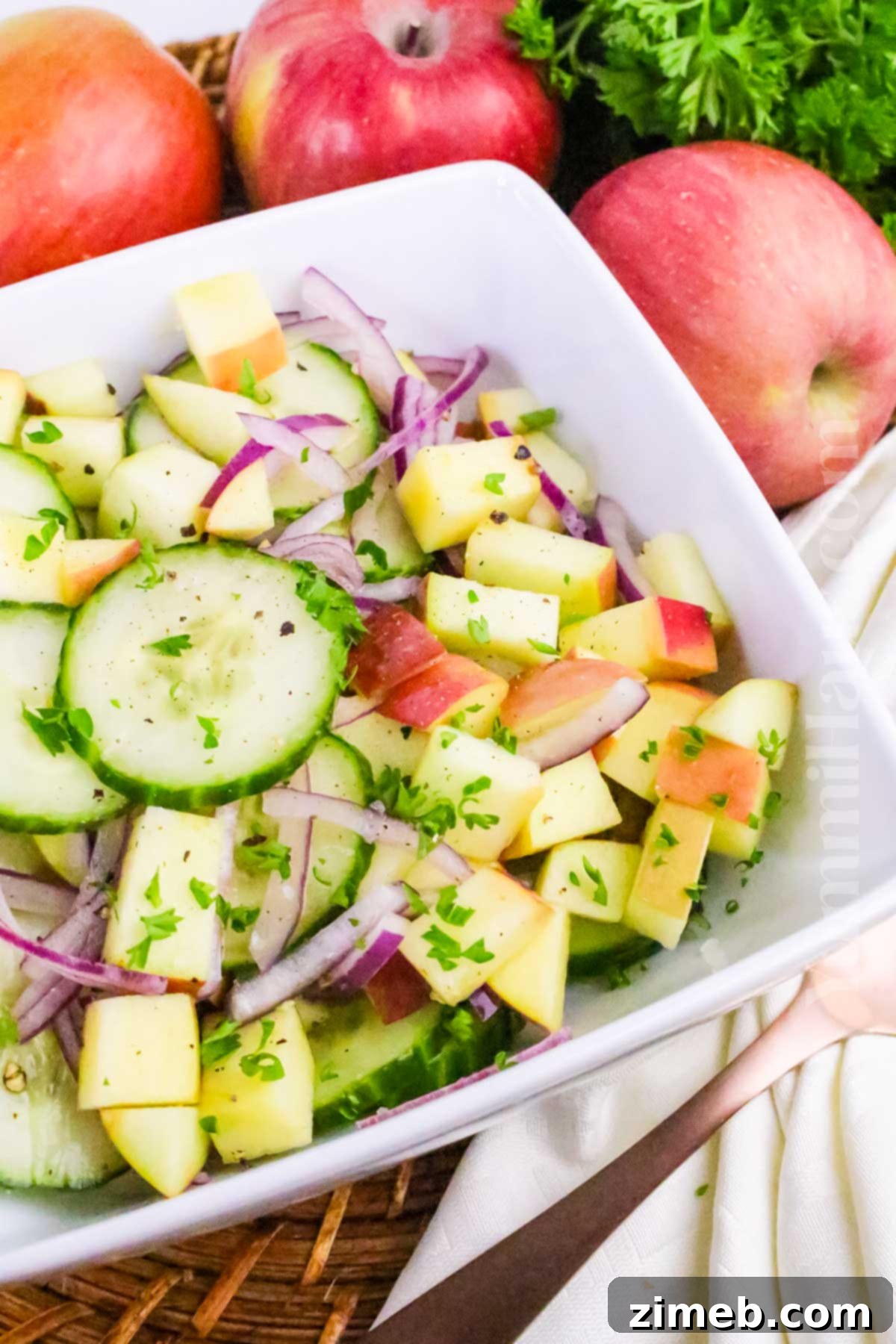 A finished Apple Cucumber Salad recipe, ready to serve.