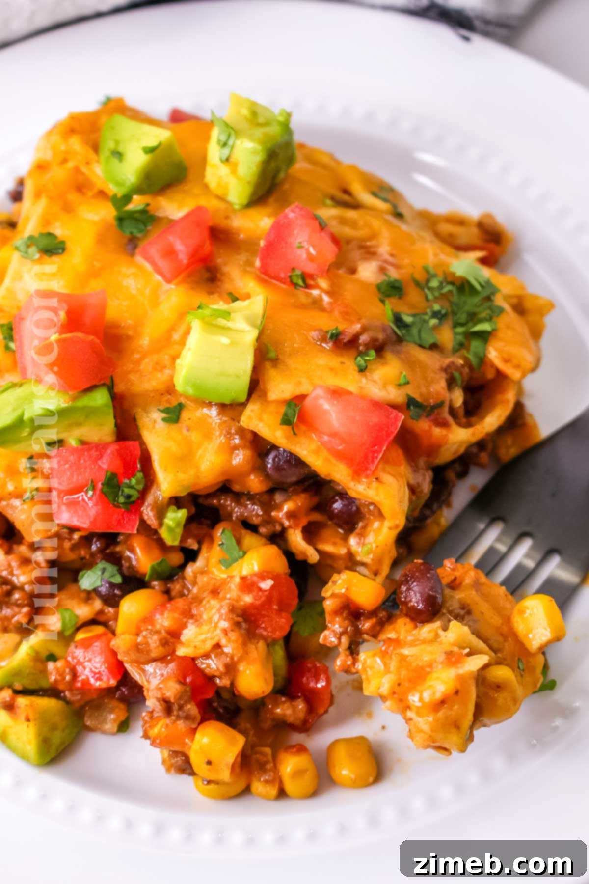 Easy Slow Cooker Mexican Casserole 16 Delicious Crockpot Mexican Casserole served in a bowl, close-up.