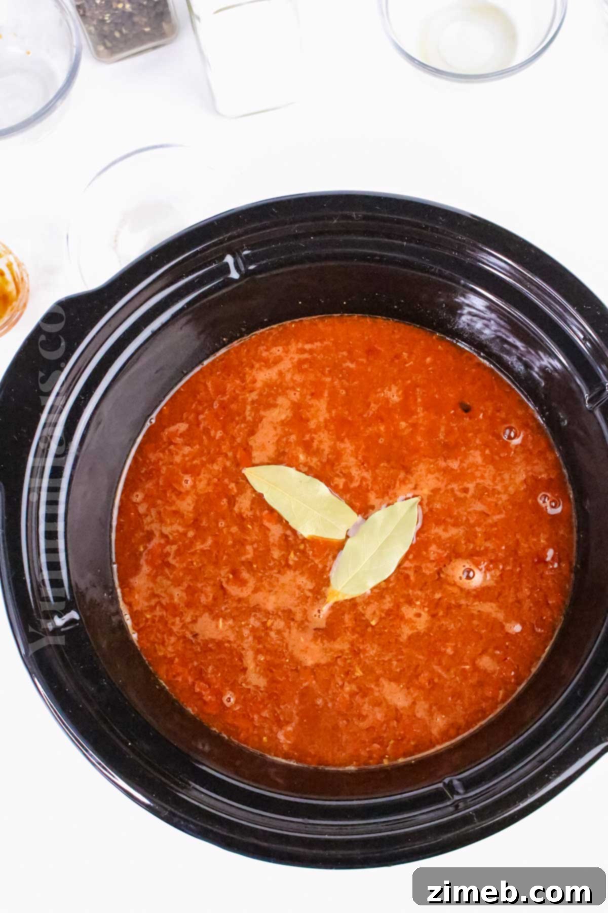 Easy Slow Cooker Birria Tacos 6 cooking the sauce