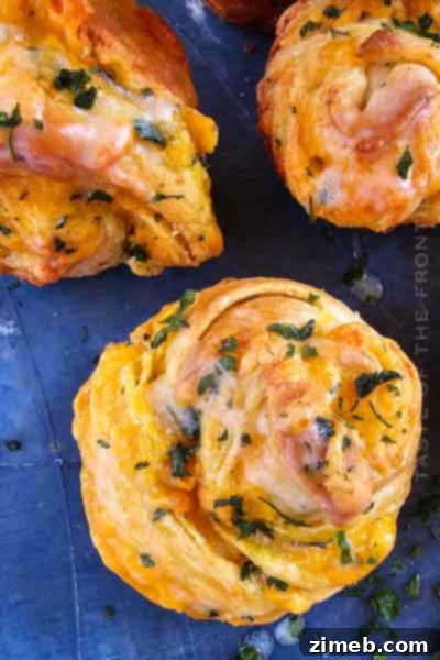 Savory Cheddar Ranch Cruffins, golden and cheesy, with flaky croissant layers infused with ranch seasoning.