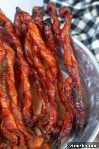 Crispy, savory Twisted Bacon strips, seasoned and beautifully curled, perfect for an impressive breakfast or brunch side.