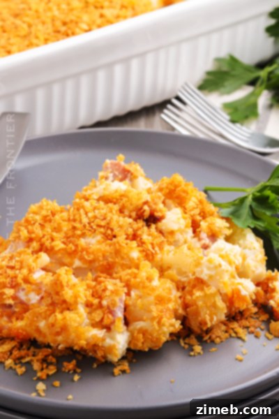 A hearty and comforting Ham and Potato Casserole, baked with savory ham, creamy potatoes, and melted cheese.