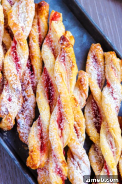 Beautiful Raspberry Pastry Twists with flaky puff pastry for Mother's Day brunch.