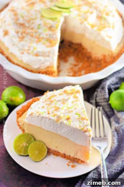 Refreshing Key Lime Pie with fluffy whipped cream, a perfect Mother's Day dessert.