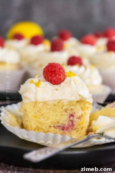 Delightful Lemon and Raspberry Cupcakes with fluffy frosting for Mother's Day.