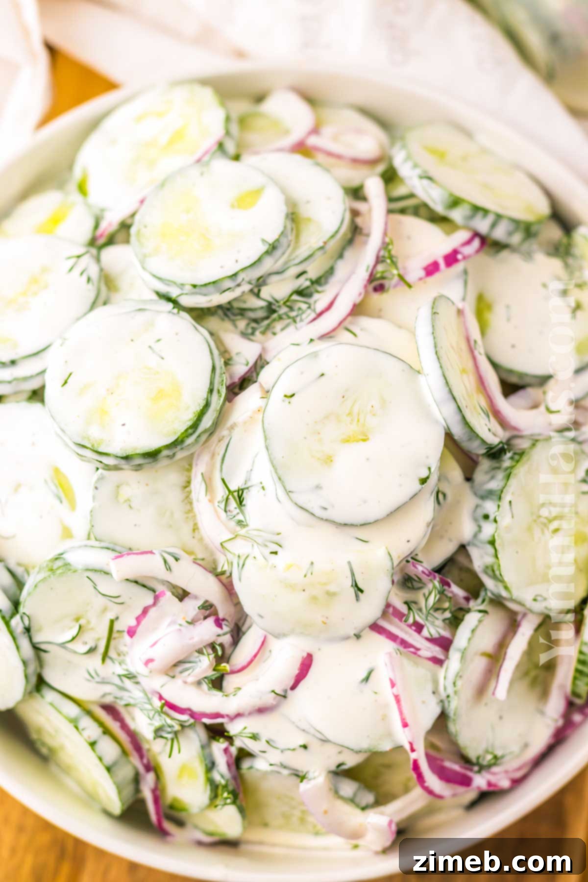 Cool and Creamy Cucumber Delight 14 Potluck side salad recipe: creamy cucumber