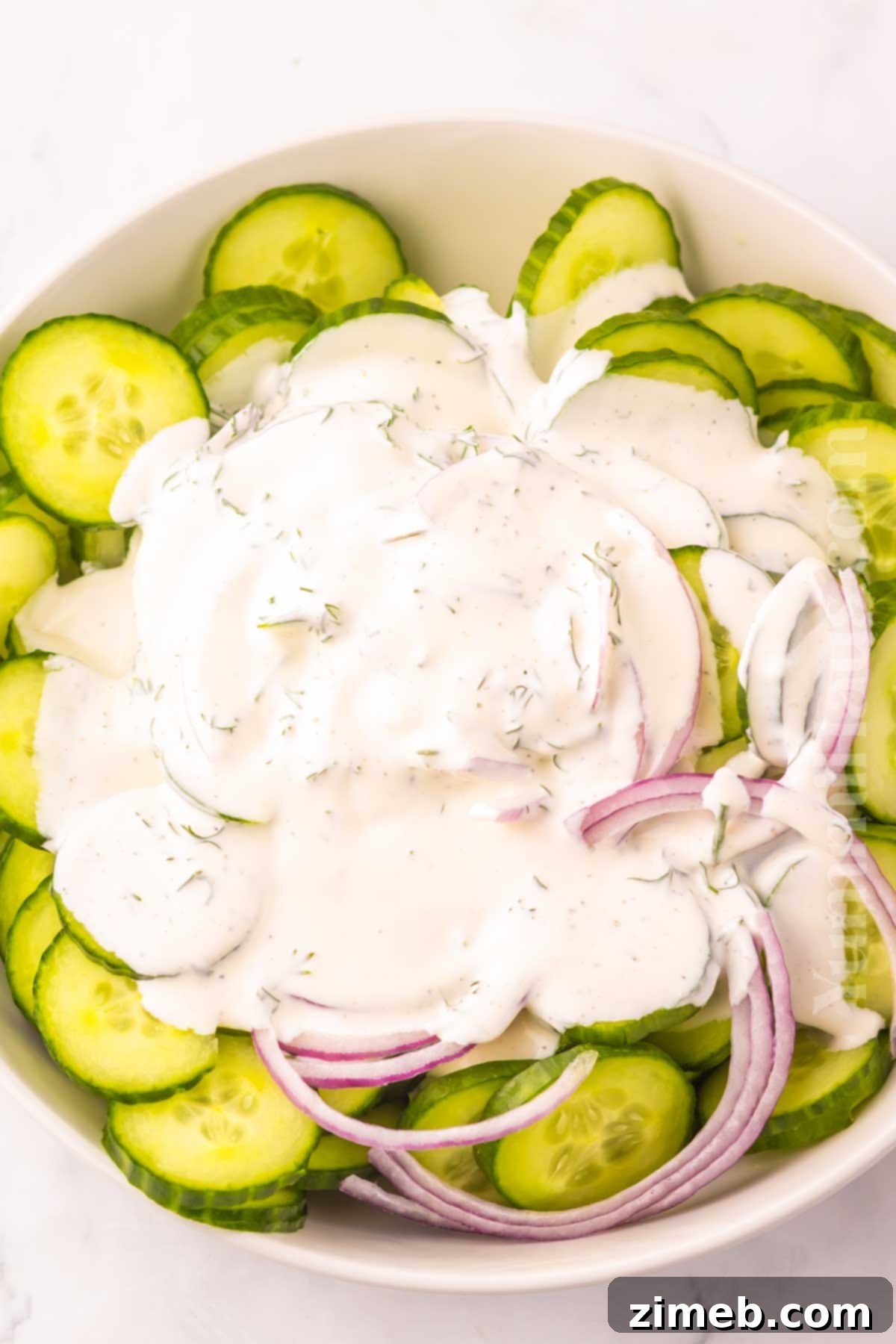 Cool and Creamy Cucumber Delight 6 How to make Creamy Cucumber Salad with fresh ingredients