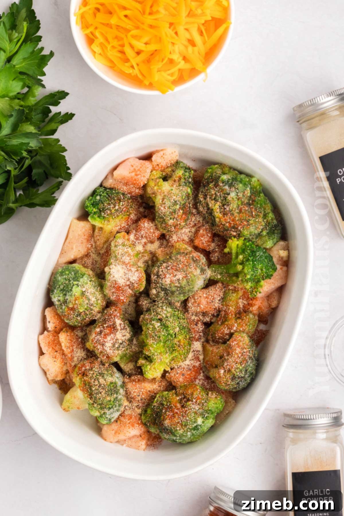 Chicken and Broccoli seasoned and ready to bake
