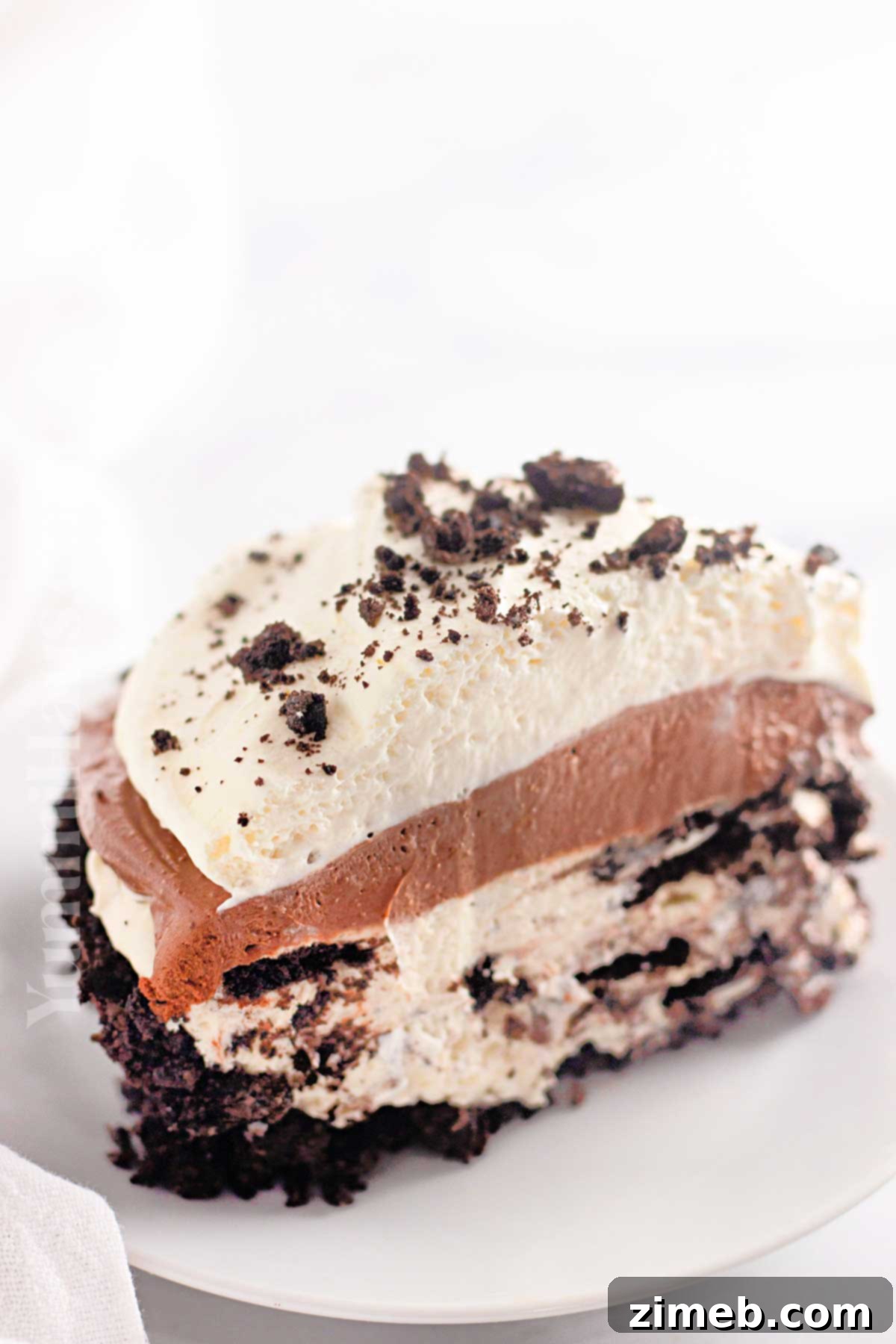 A beautiful layered cream pie, showcasing its rich textures and flavors