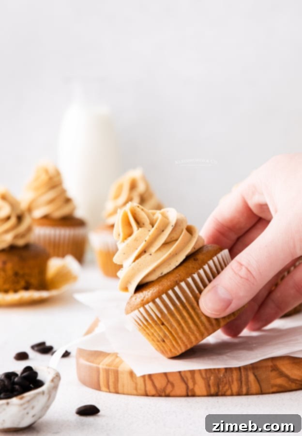 Celebrate with Cupcakes: Endless Flavors for Every Occasion 4 Thanksgiving cupcakes with pumpkin spice flavor and espresso frosting, perfect for autumn.