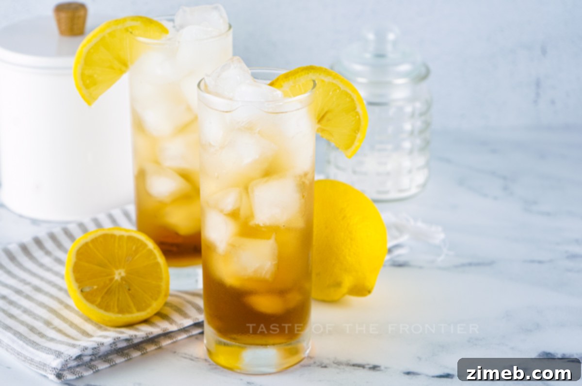 mixed drink with coke in a tall glass