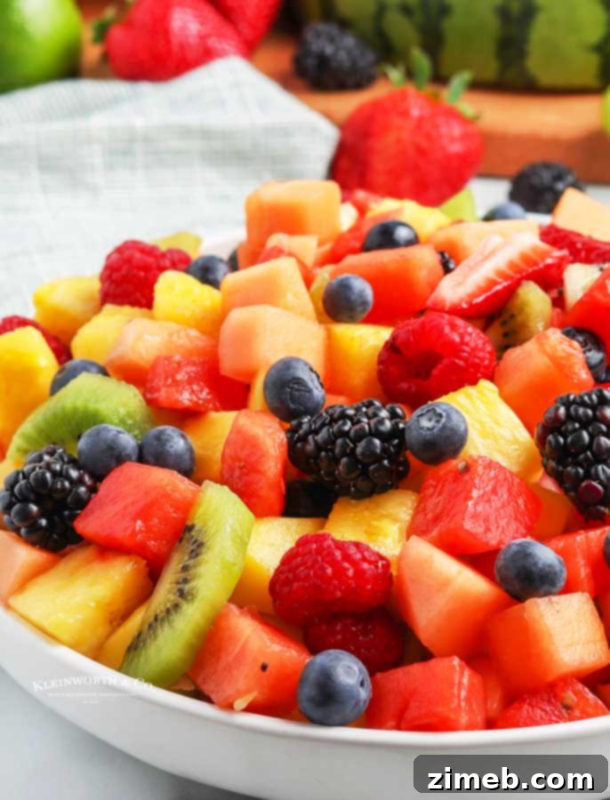 32 Delicious and Refreshing Summer Salad Recipes 15 Easy Fruit Salad - A colorful assortment of fresh summer fruits.