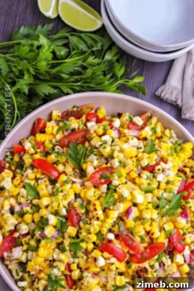 32 Delicious and Refreshing Summer Salad Recipes 21 Grilled Corn Salad - A smoky and sweet salad made with grilled corn, tomatoes, and bell peppers.