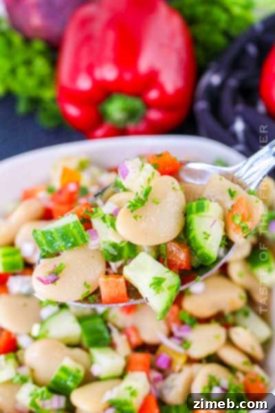 32 Delicious and Refreshing Summer Salad Recipes 8 Butter Bean Salad - A bowl of tender butter beans with fresh vegetables and vinaigrette.