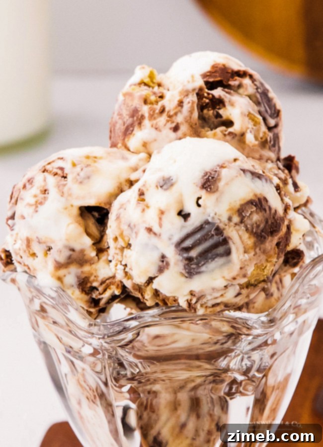 35 Refreshing Summer Frozen Treats 23 Recipe for Moose Tracks Ice Cream, a no-churn dessert loaded with peanut butter cups and chocolate fudge.