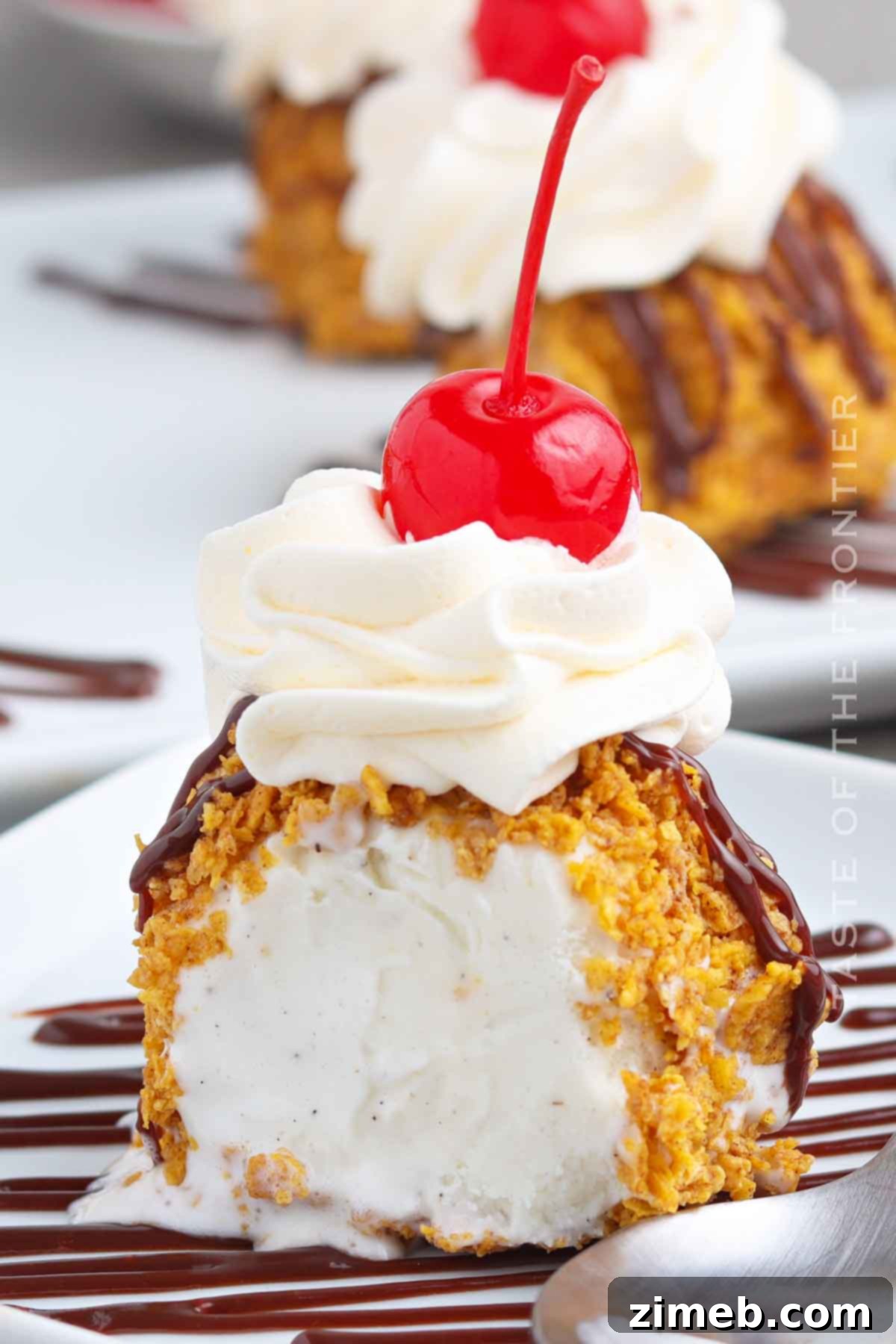 35 Refreshing Summer Frozen Treats 8 Easy Fried Ice Cream Recipe with a crunchy cereal coating and creamy ice cream center.