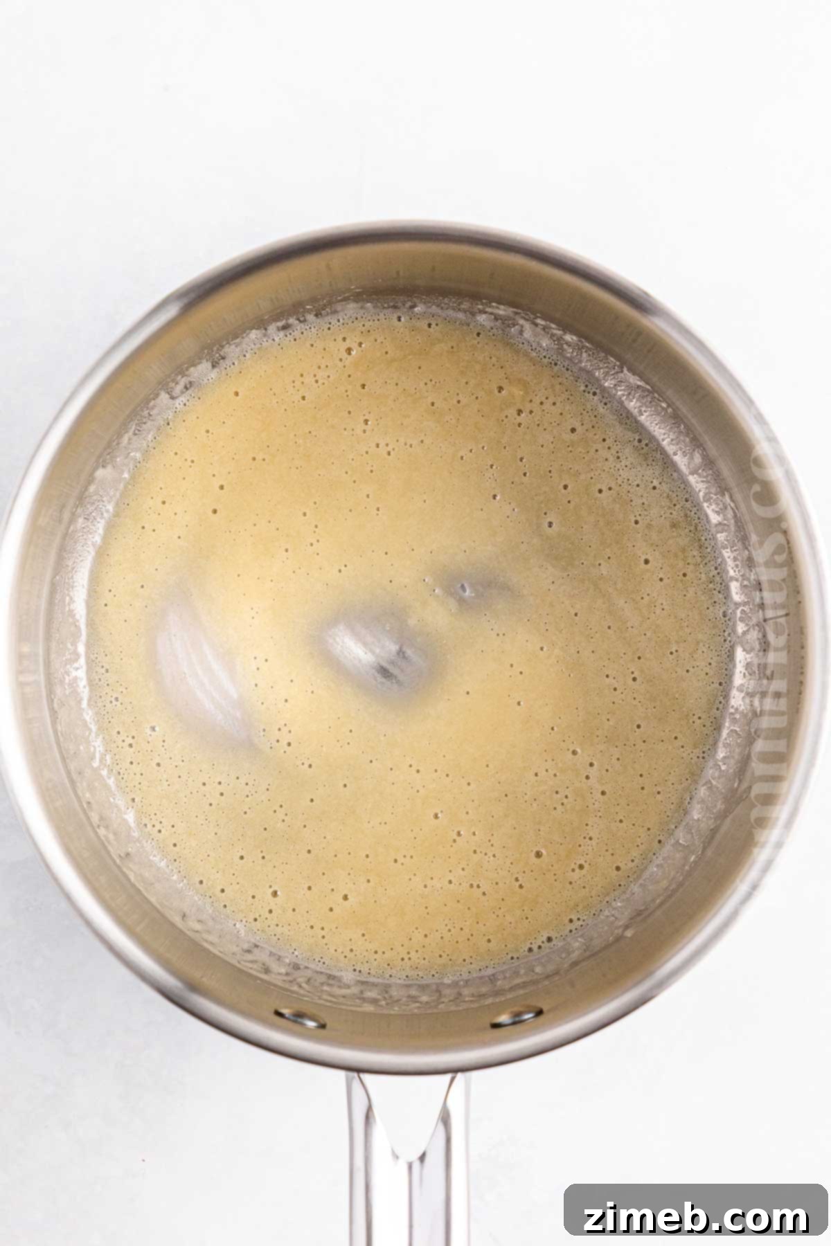 The Ultimate Creamy Cheddar Sauce 5 roux in the saucepan