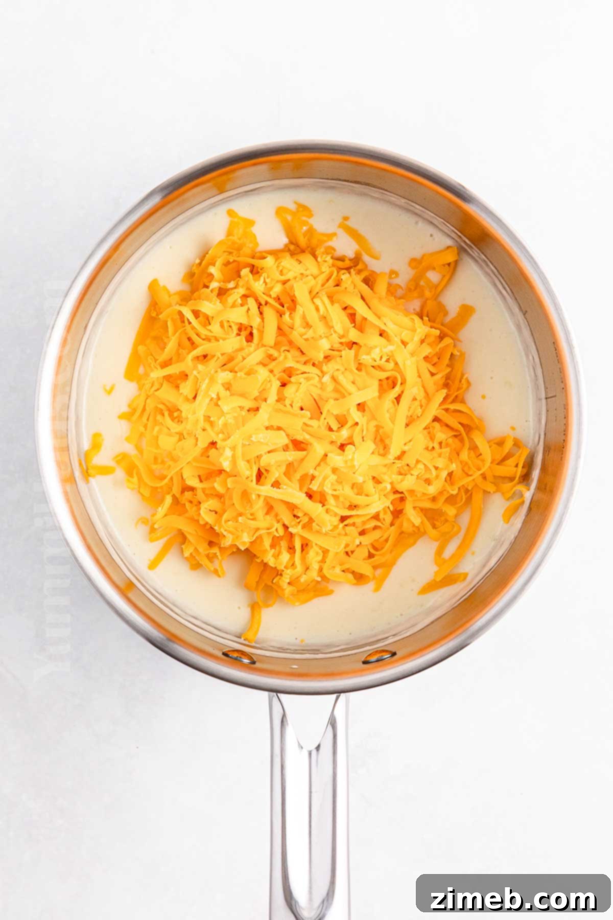 The Ultimate Creamy Cheddar Sauce 8 how to make Cheddar Cheese Sauce