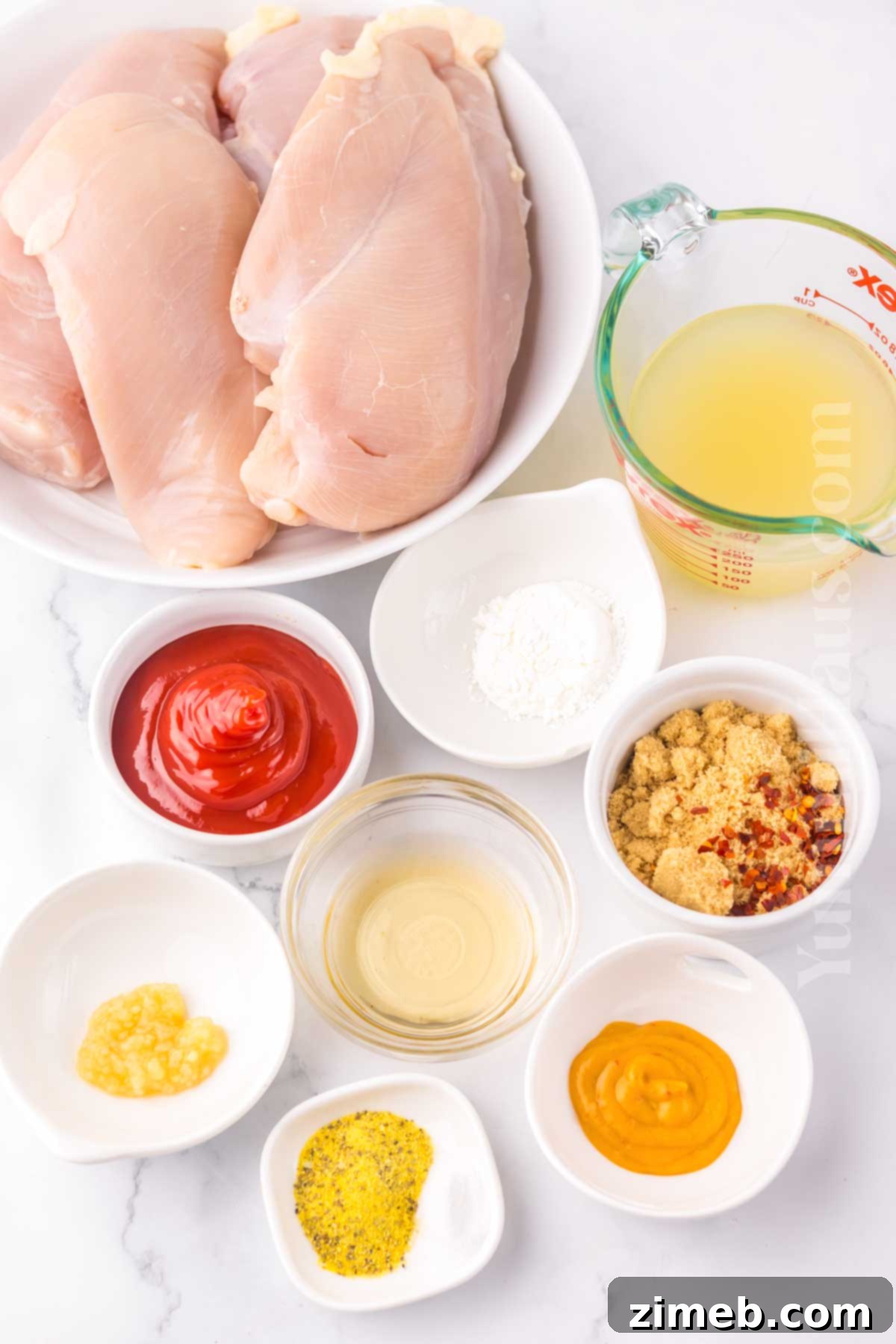 Sweet and Tart Slow Cooker Chicken 4 Fresh ingredients laid out for Slow Cooker Lemonade Chicken recipe preparation.