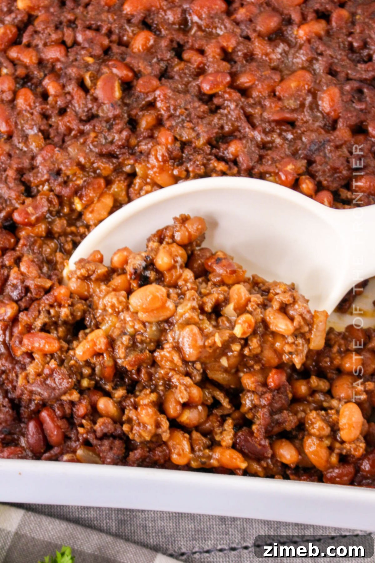 55 Irresistible Sides to Elevate Your Summer BBQ 27 Baked Beans with Ground Beef