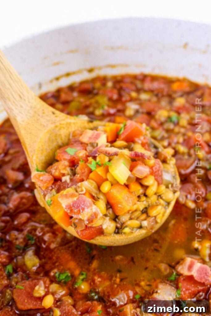 Autumn's Warm Embrace: Comforting Soups to Banish the Chill 18 Hearty Bacon and Lentil Soup, a perfect one-pot evening meal packed with comfort food flavors for the family.
