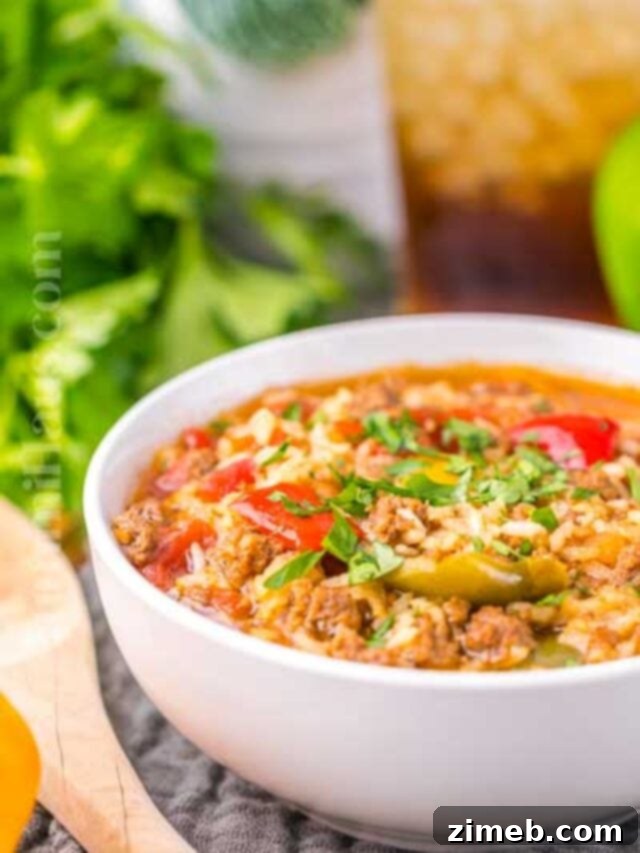Autumn's Warm Embrace: Comforting Soups to Banish the Chill 5 Hearty Stuffed Pepper Soup with ground beef, bell peppers, tomatoes, and rice in a flavorful broth.