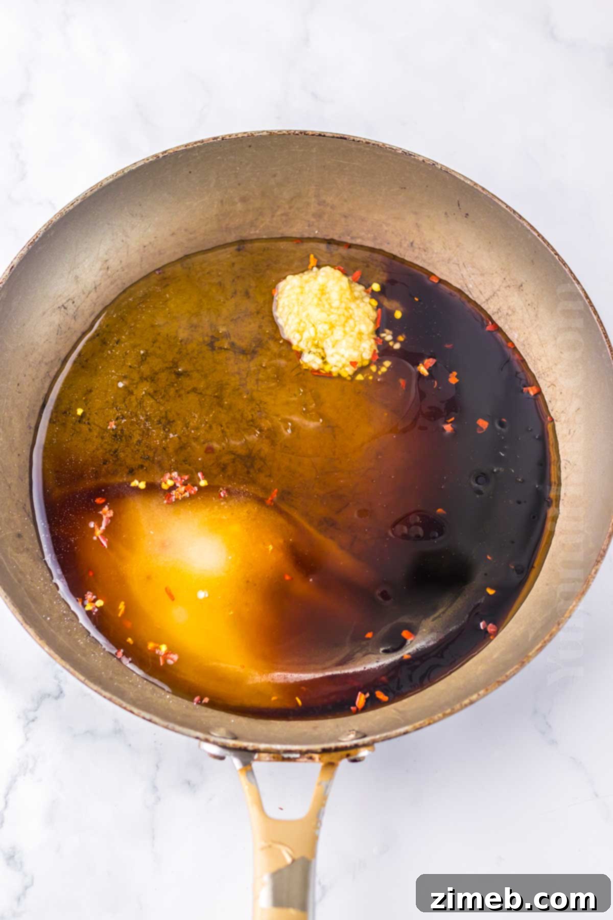 Easy Panda Express Honey Sesame Chicken Copycat 7 honey sauce - in the skillet