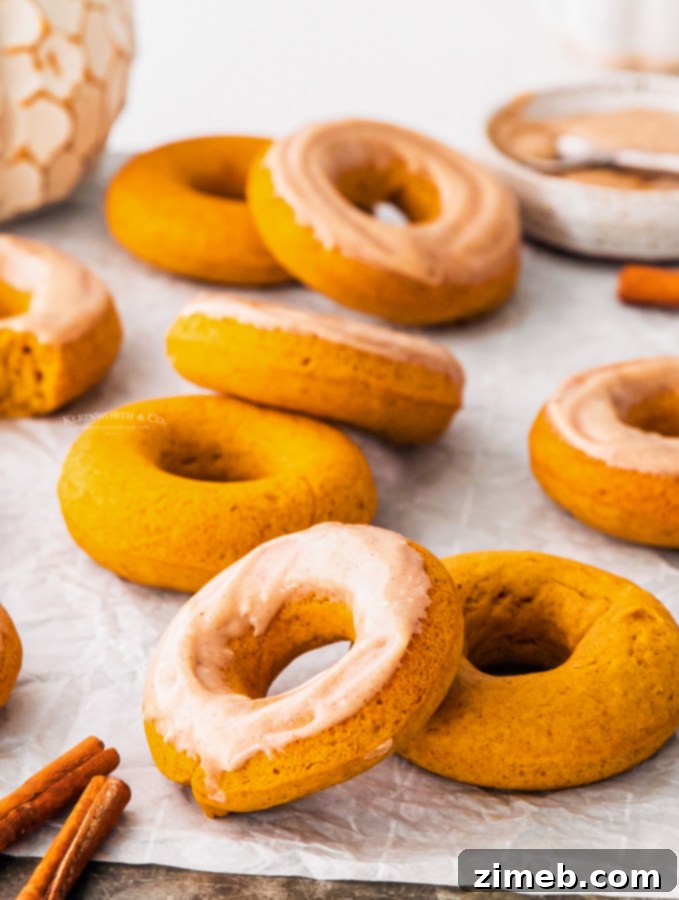 32 Irresistible Pumpkin Treats To Sweeten Your Fall 19 Baked Pumpkin Donuts with Maple Cream Cheese Icing