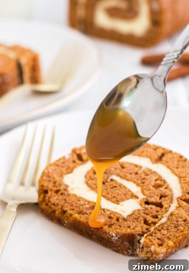 32 Irresistible Pumpkin Treats To Sweeten Your Fall 22 Pumpkin Roll Cake with Bourbon Caramel Sauce