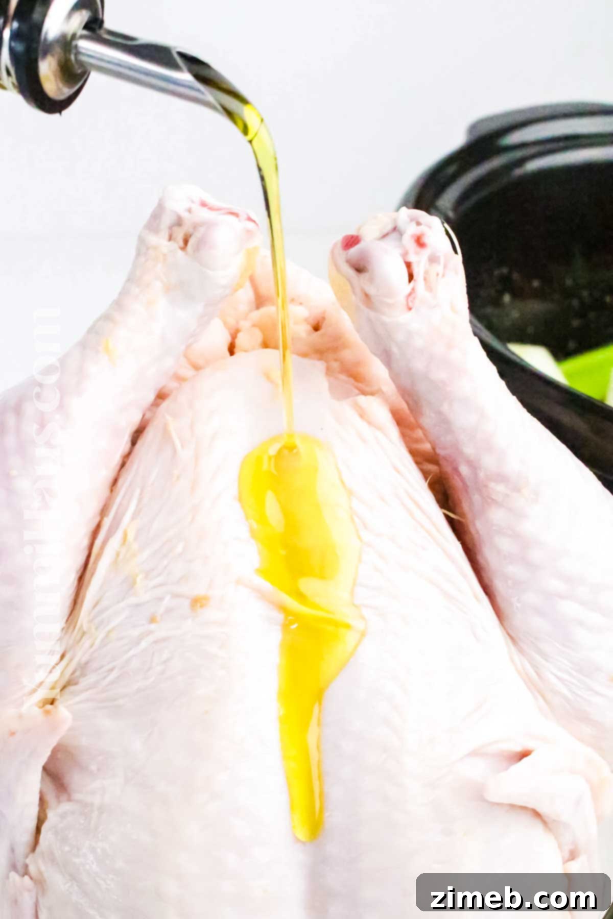 Effortless Slow Cooker Whole Chicken 6 oiling the chicken - Slow Cooker Whole Chicken