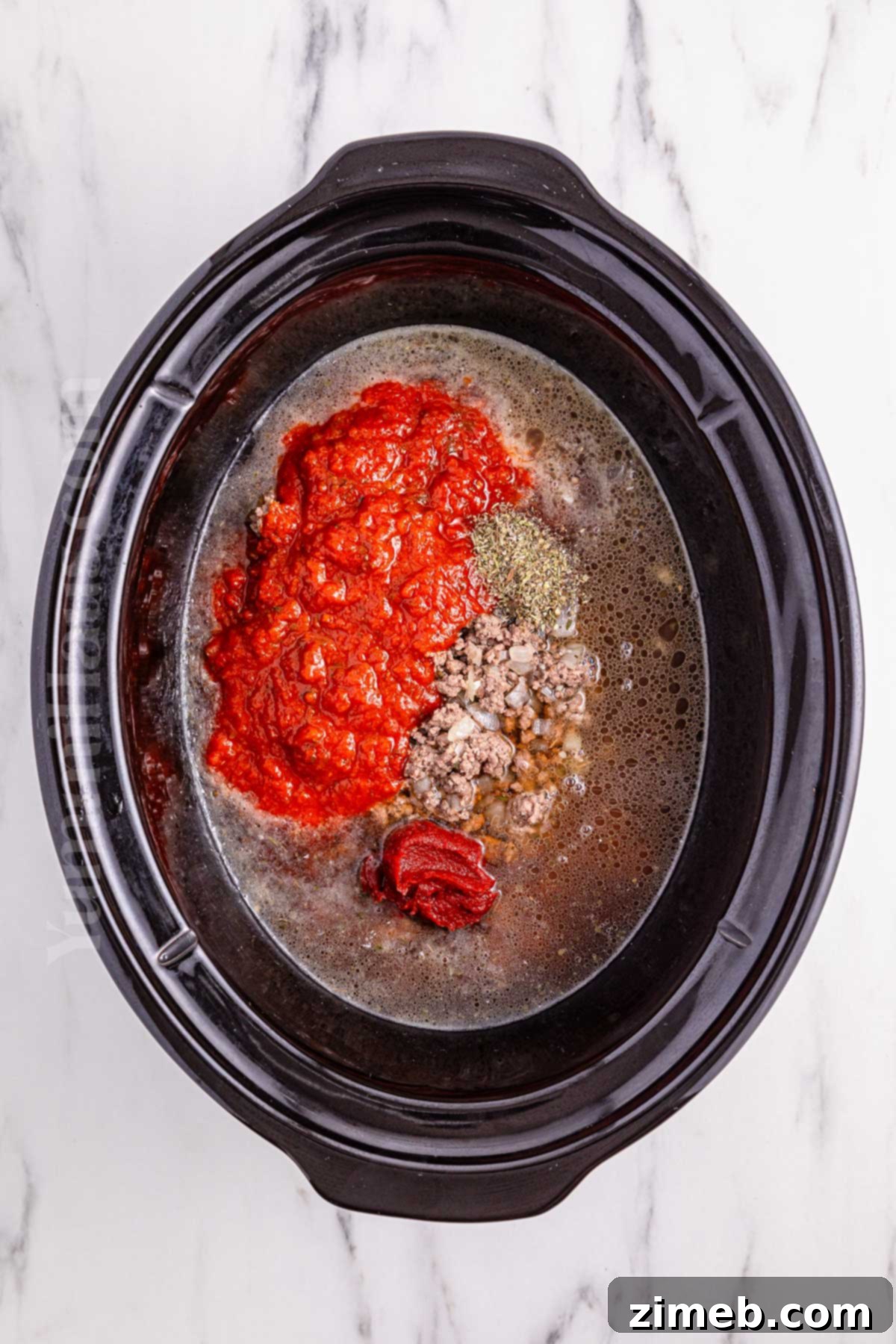 Adding broken lasagna noodles to the slow cooker soup