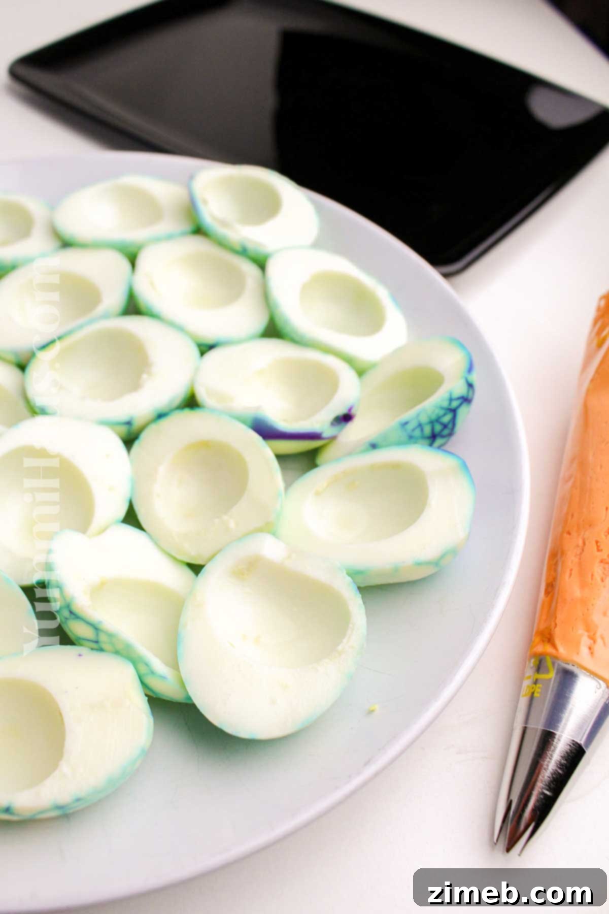 Spooky Deviled Eggs 10 Halloween Deviled Eggs ready to be filled.