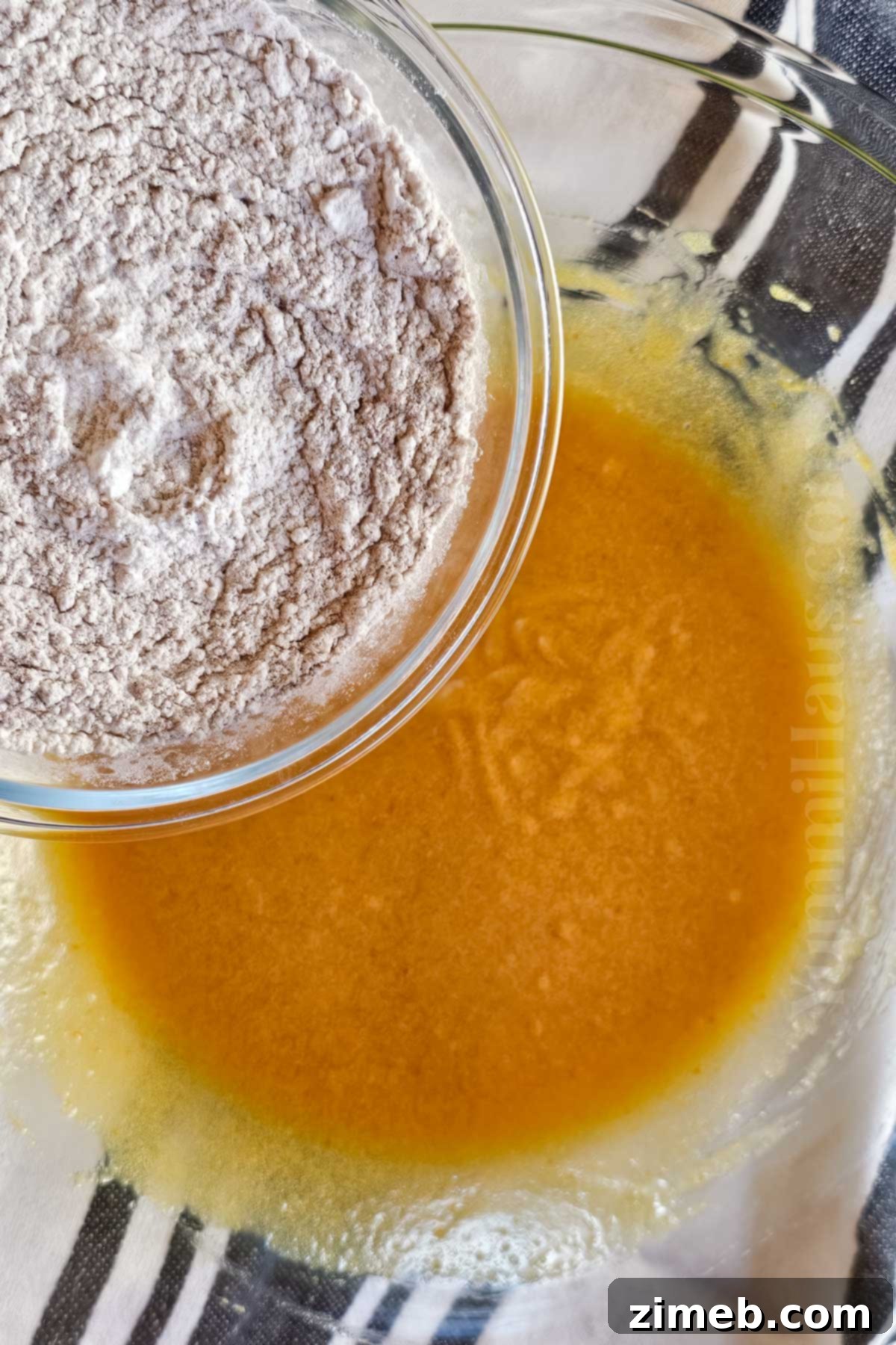 Mixing the dry and wet ingredients for Pumpkin Snickerdoodles dough