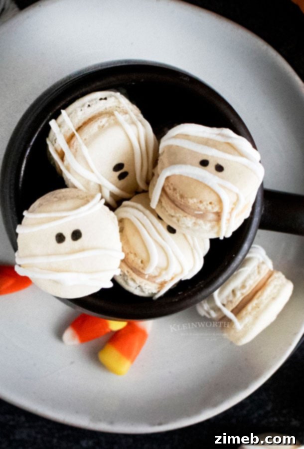 26 Spookily Simple Halloween Desserts 24 Mummy Macarons for Halloween