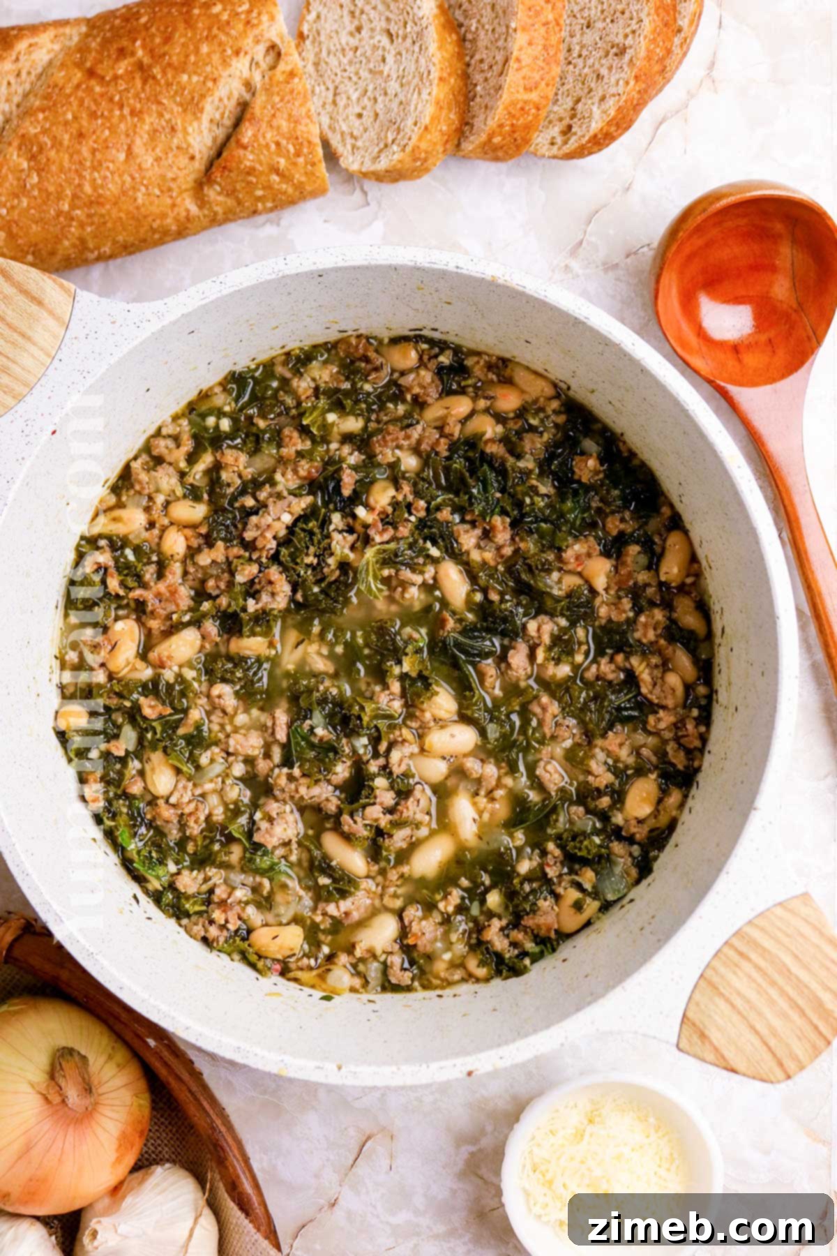 Tuscan Sausage, Kale, and White Bean Soup 7 A large pot filled with the finished Cannellini Bean, Sausage, and Kale Soup, ready to be served.