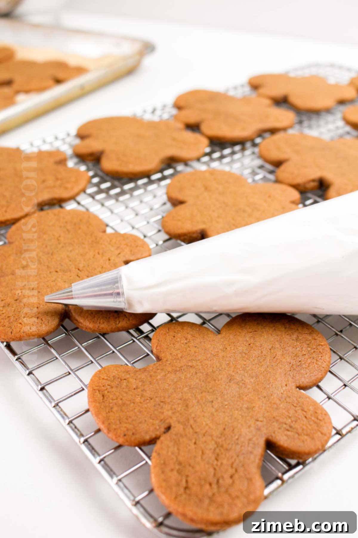Perfectly piped royal icing on decorated cookies, showcasing its smooth and glossy finish.