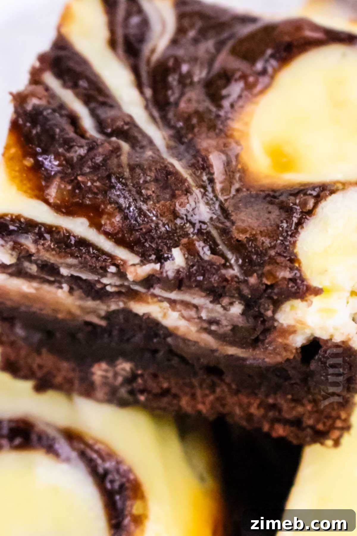brownie bars with cheesecake swirls ready to be served